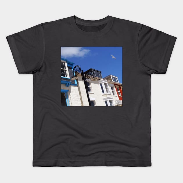 Lyme Regis, Seafront Buildings Kids T-Shirt by JonDelorme